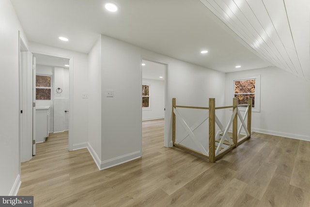 hallway with light wood-type flooring