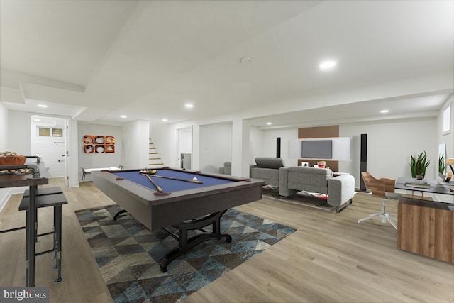 recreation room with light hardwood / wood-style flooring and billiards