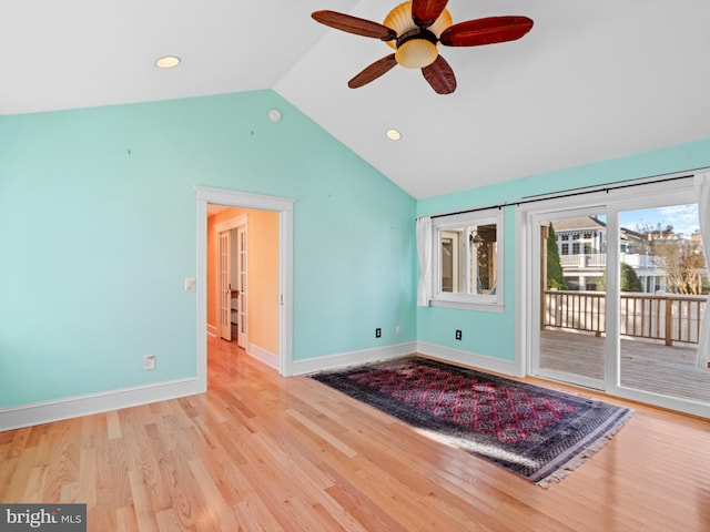 interior space featuring light wood-type flooring, ceiling fan, and lofted ceiling