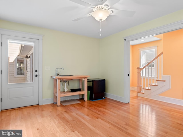 miscellaneous room featuring light wood-type flooring and ceiling fan