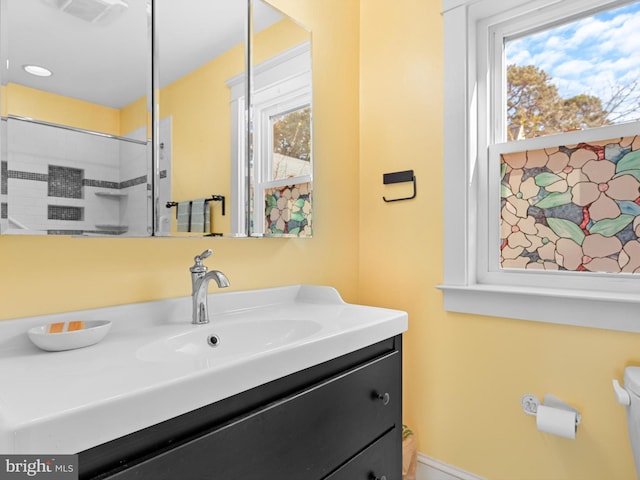 bathroom with vanity and toilet