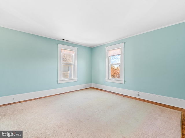 108 Philadelphia St Unit B, Rehoboth Beach, DE 19971 - unfurnished room featuring healthy amount of natural light and ornamental molding