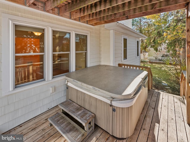 deck with a hot tub