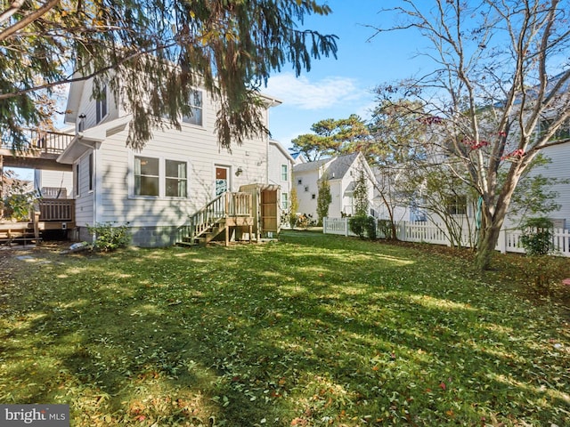 view of yard featuring a deck