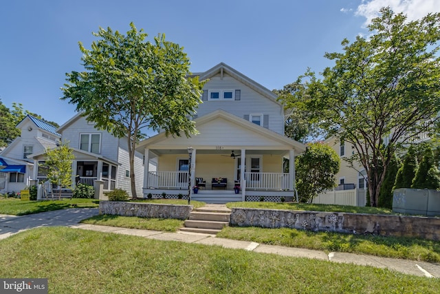 108 Philadelphia St Unit B, Rehoboth Beach, DE 19971 - traditional style home with a porch and a front lawn