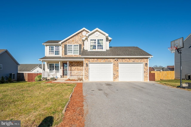 view of front of home with a porch, central AC unit, and a front lawn