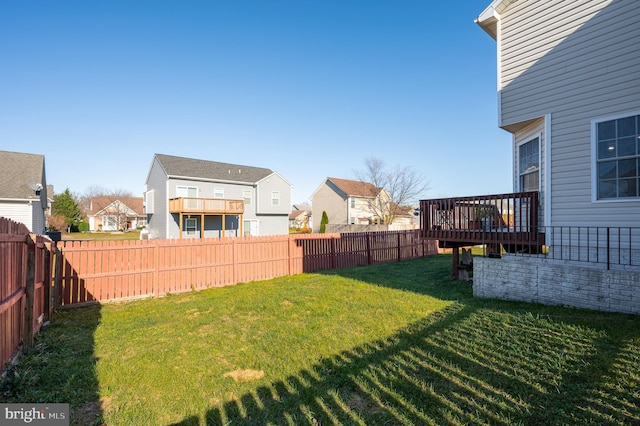 view of yard with a wooden deck