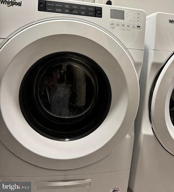 laundry room featuring washer / dryer