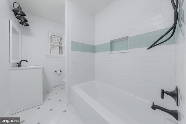 bathroom with shower / bath combination, visible vents, toilet, vanity, and baseboards