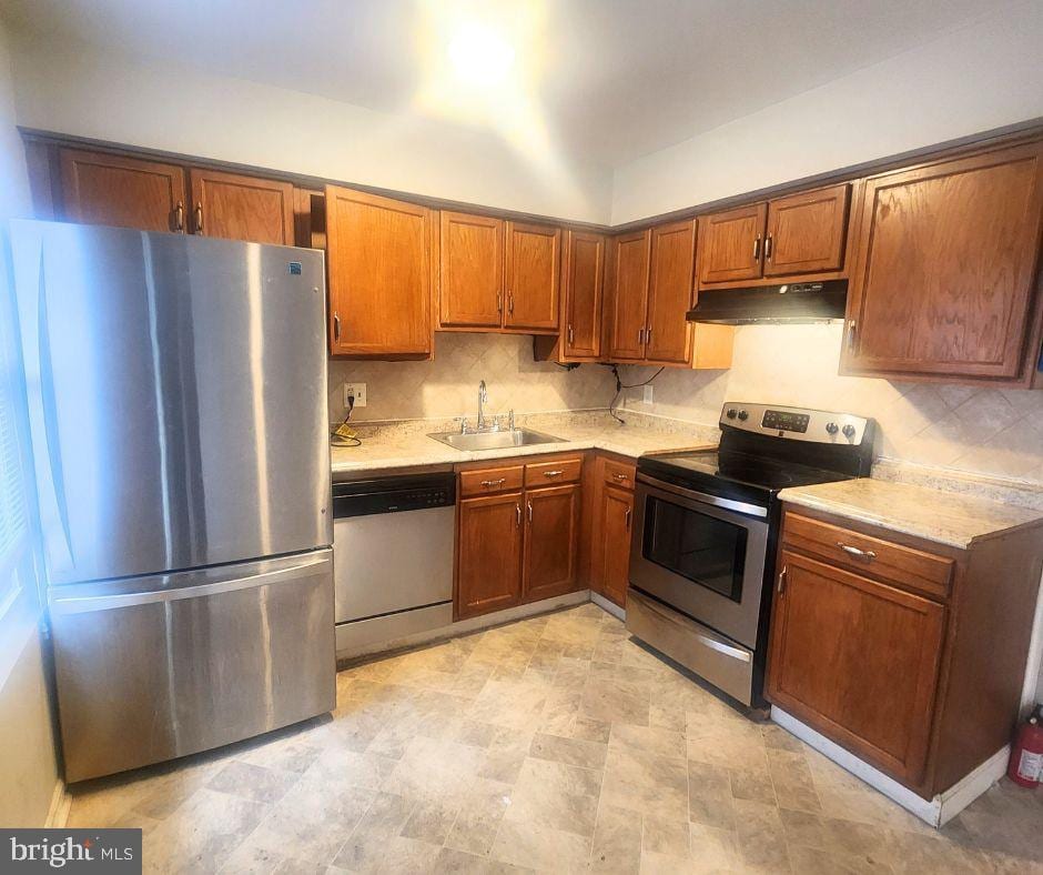 kitchen featuring sink and stainless steel appliances