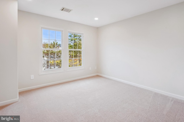 view of carpeted spare room