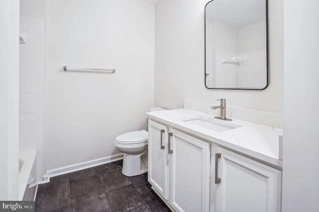 full bathroom with bathing tub / shower combination, vanity, wood-type flooring, and toilet