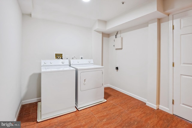 washroom with independent washer and dryer