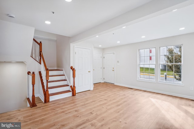 basement featuring light hardwood / wood-style flooring