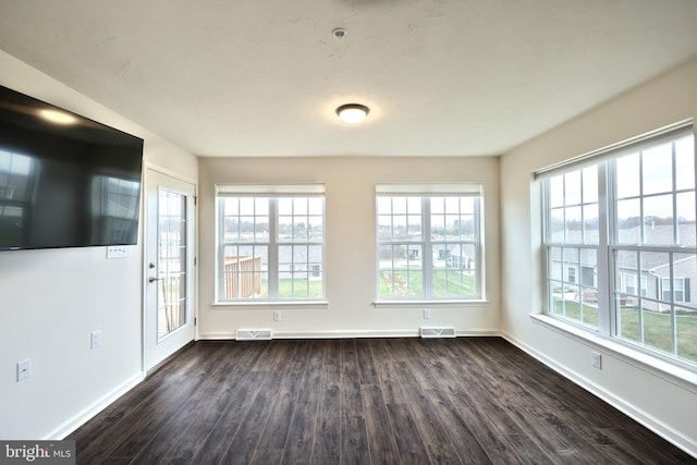 interior space with dark hardwood / wood-style floors