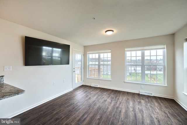 223 Jutland Way Unit 266, Red Lion, PA 17356 - unfurnished living room featuring dark wood finished floors and baseboards
