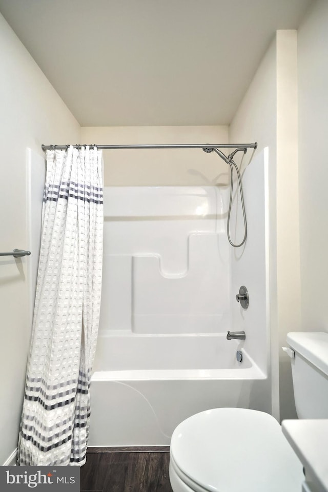223 Jutland Way Unit 266, Red Lion, PA 17356 - bathroom with toilet, shower / bath combination with curtain, and wood finished floors