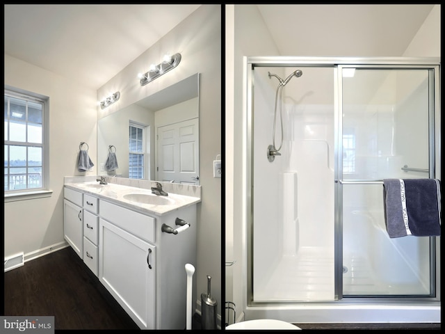 223 Jutland Way Unit 266, Red Lion, PA 17356 - bathroom with a stall shower, double vanity, wood finished floors, and baseboards