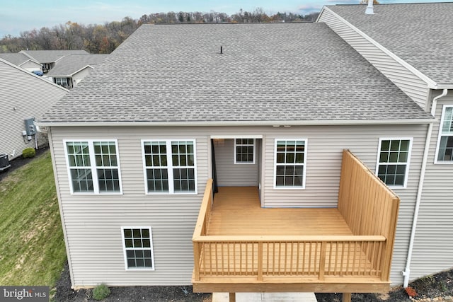 223 Jutland Way Unit 266, Red Lion, PA 17356 - rear view of house with roof with shingles, a wooden deck, and central AC