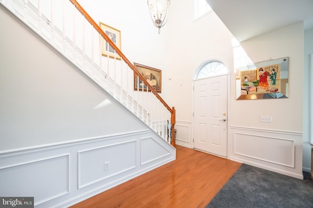 foyer with wood-type flooring