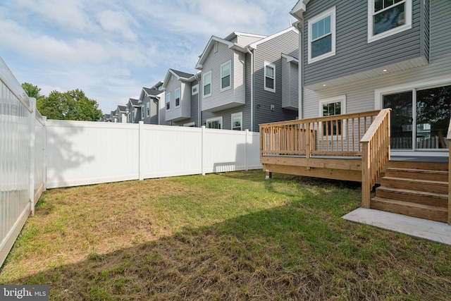 view of yard featuring a deck