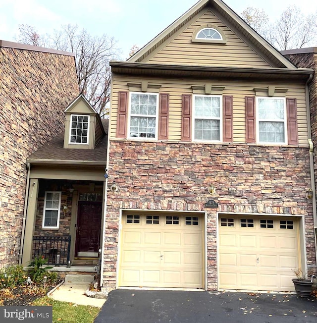 view of front of property featuring a garage