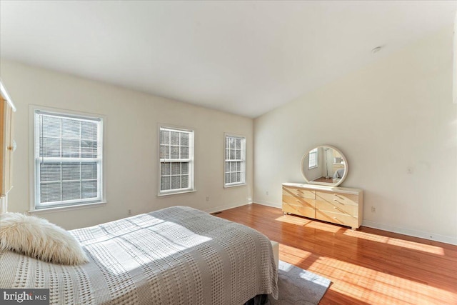 bedroom featuring hardwood / wood-style flooring