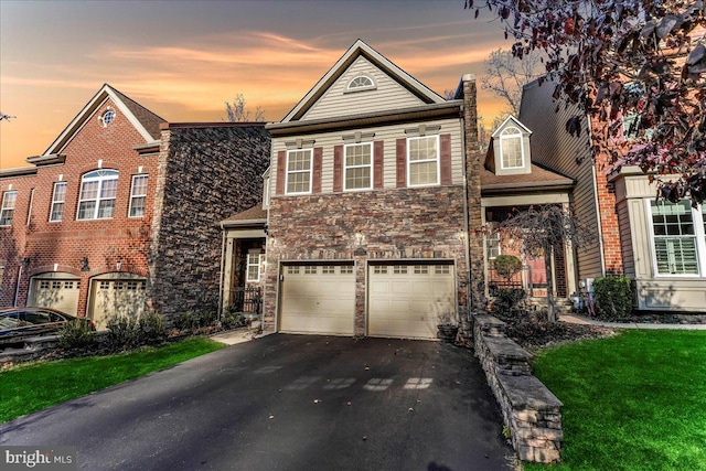 front facade with a garage