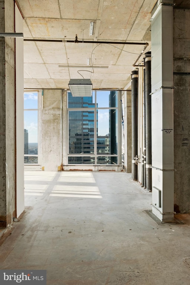 misc room with concrete floors