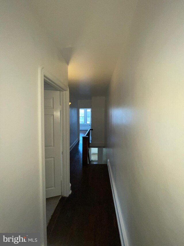 2014 Castor Ave, Philadelphia, PA 19134 - corridor with baseboards and dark wood-style floors