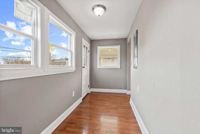 639 S Conkling St, Baltimore, MD 21224 - spare room with hardwood / wood-style flooring and baseboards
