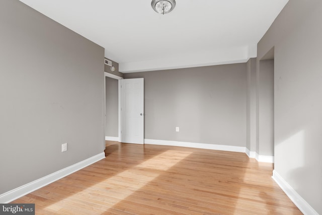 empty room featuring light hardwood / wood-style floors