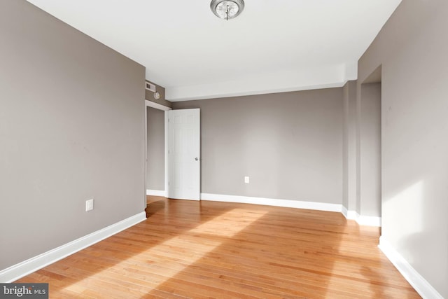 639 S Conkling St, Baltimore, MD 21224 - empty room with light wood-type flooring and baseboards