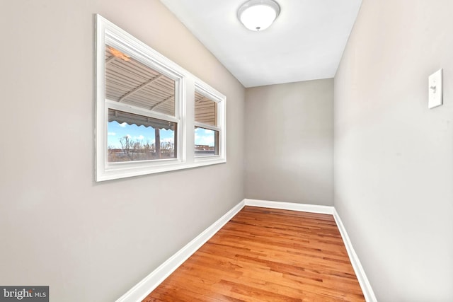 639 S Conkling St, Baltimore, MD 21224 - spare room featuring baseboards and light wood-type flooring