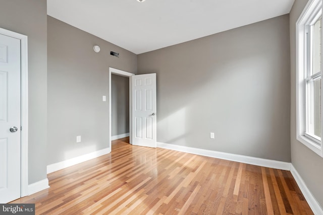 unfurnished bedroom with light hardwood / wood-style flooring