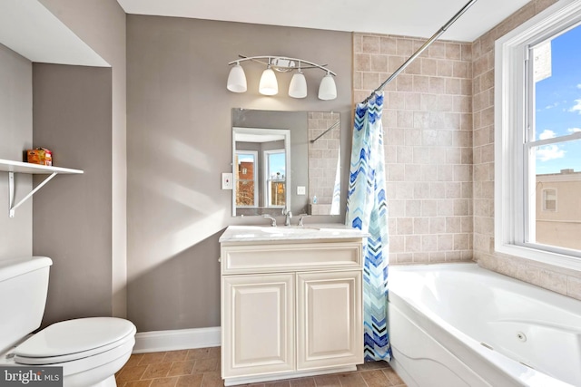 639 S Conkling St, Baltimore, MD 21224 - bathroom with toilet, vanity, baseboards, and a combined bath / shower with jetted tub
