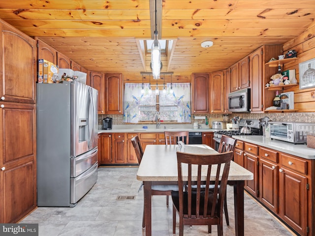 kitchen featuring decorative backsplash, wooden ceiling, decorative light fixtures, and appliances with stainless steel finishes