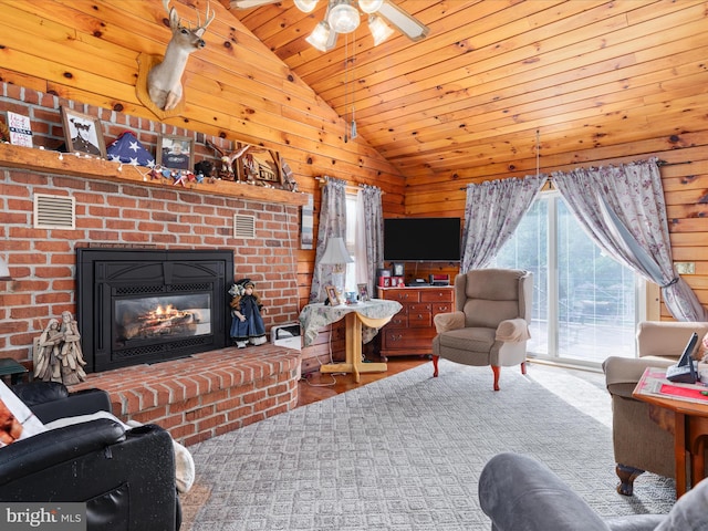 living room featuring wood walls, high vaulted ceiling, hardwood / wood-style flooring, ceiling fan, and wood ceiling