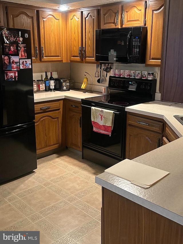 kitchen featuring black appliances