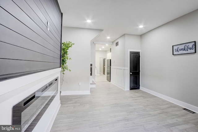 hall featuring light hardwood / wood-style flooring