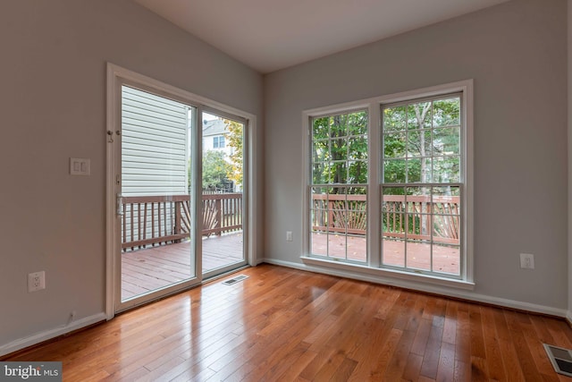 empty room featuring light hardwood / wood-style floors