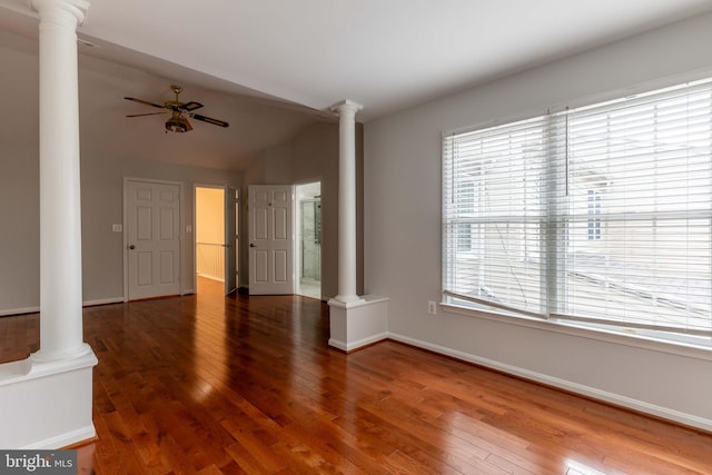 unfurnished living room with lofted ceiling, ceiling fan, and dark wood-type flooring