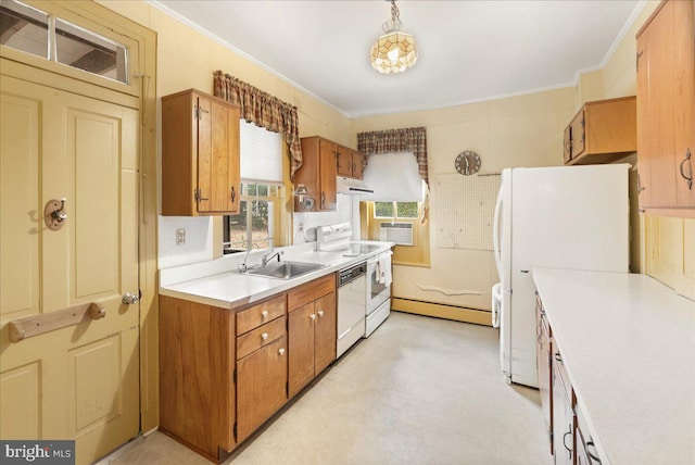 kitchen featuring crown molding, white appliances, sink, and baseboard heating