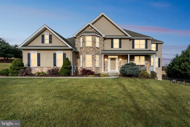 craftsman house featuring a lawn