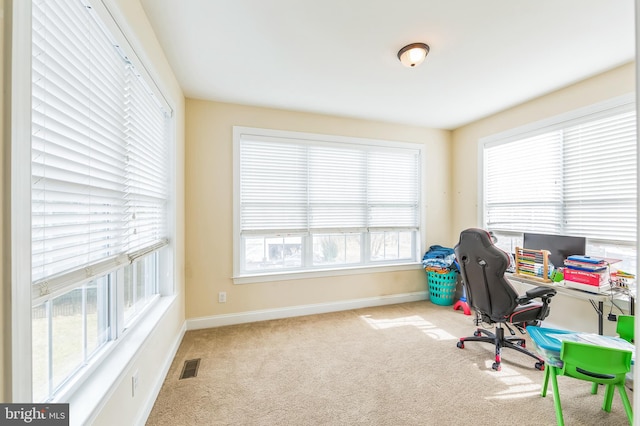 home office featuring light carpet