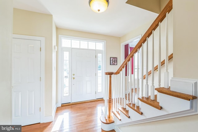 entrance foyer with light wood-type flooring