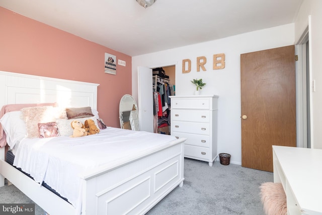 carpeted bedroom featuring a closet