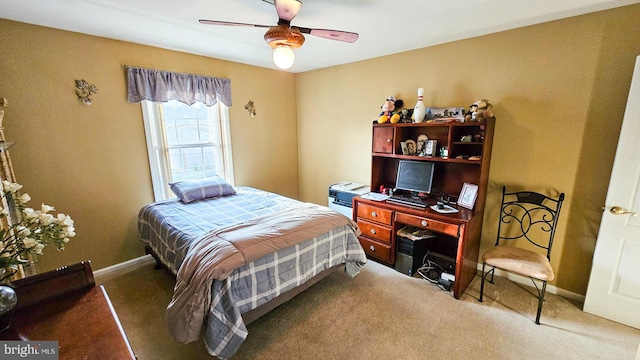 bedroom featuring carpet and ceiling fan