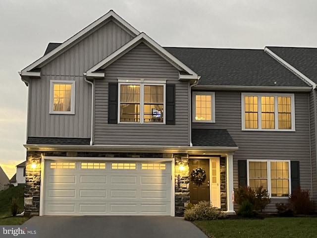 view of front of home with a garage