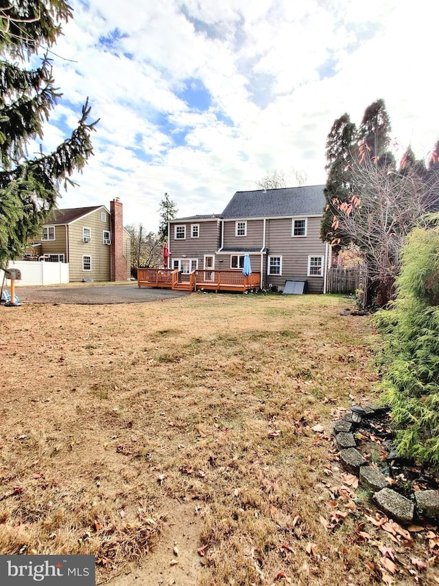 view of yard with a deck